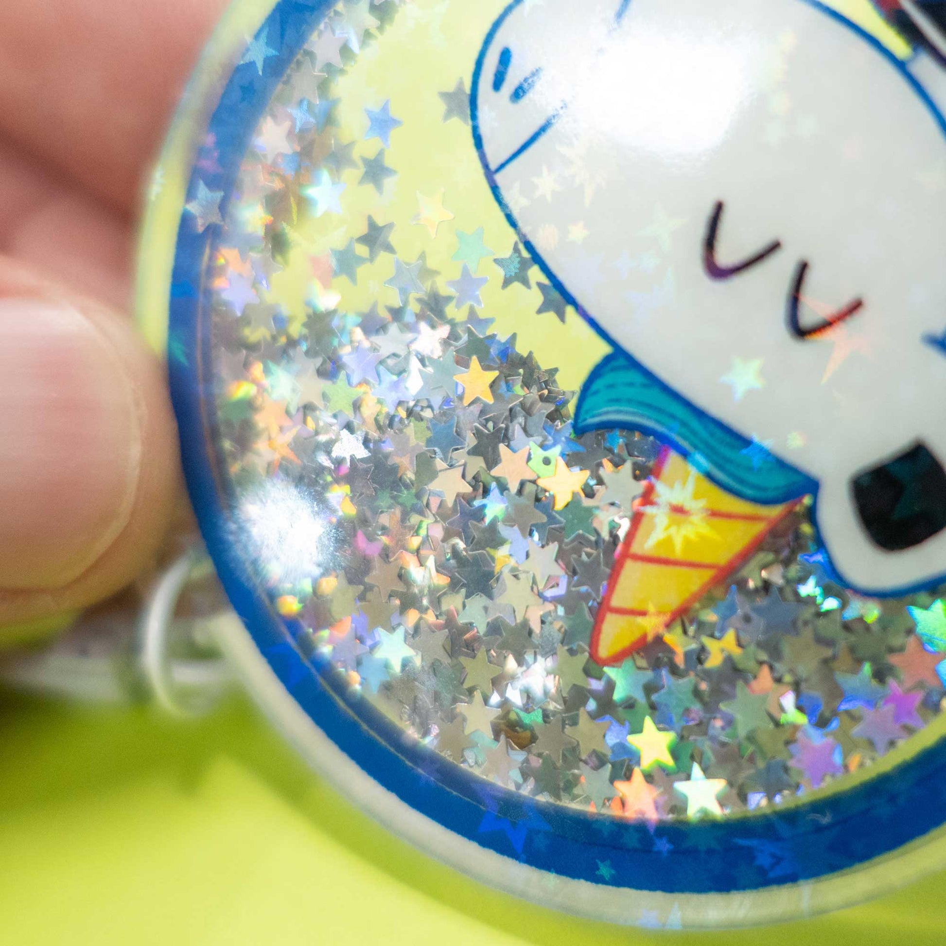 cute unicorn shaker keychain close up of stars