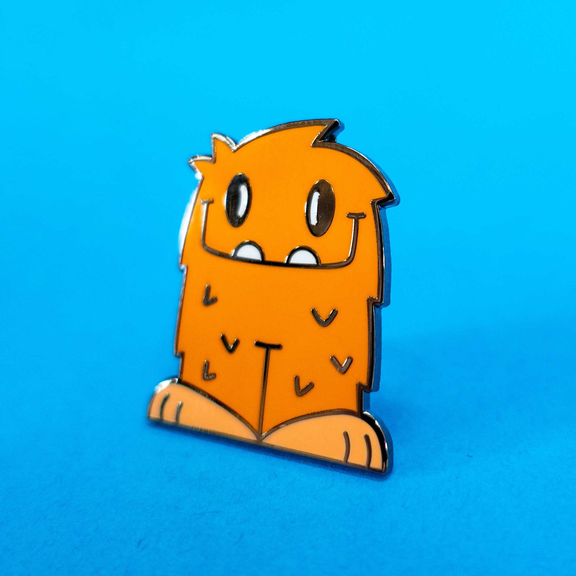 reggie the cute little monster enamel pin