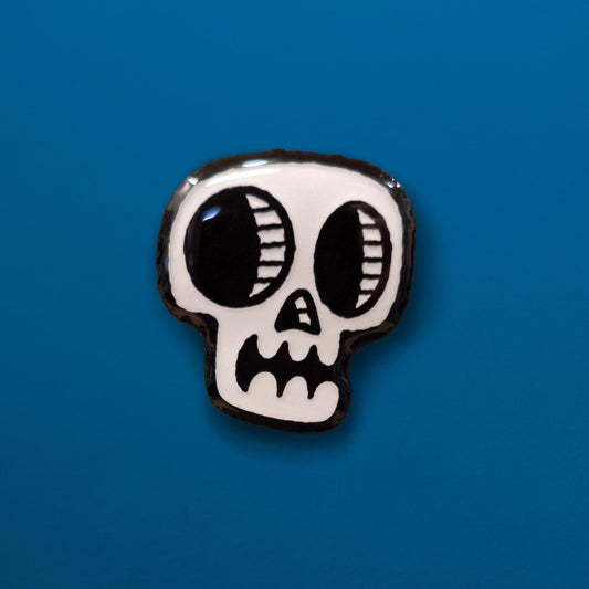 glow in the dark skull enamel pin