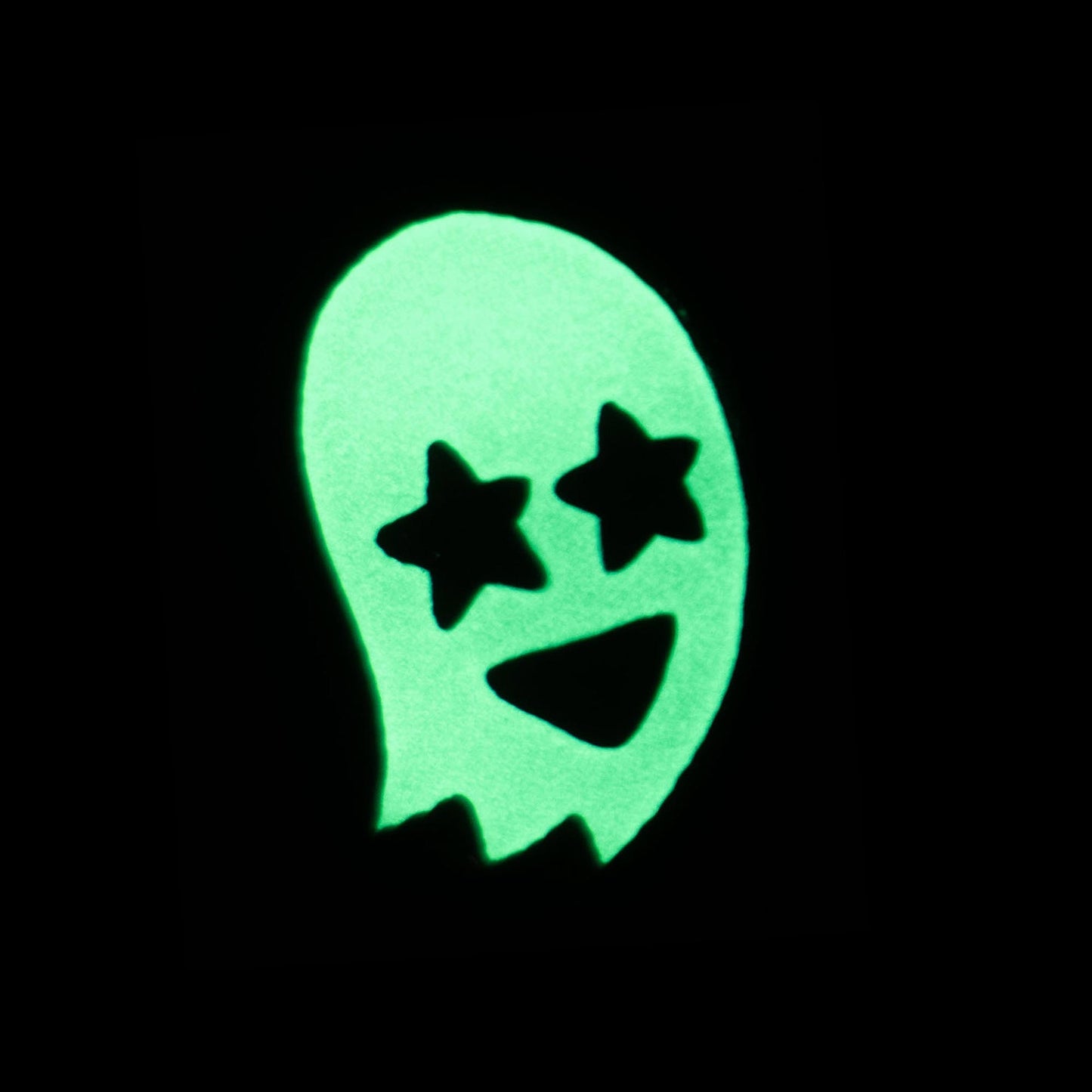 glowing starry eyed ghost enamel pin